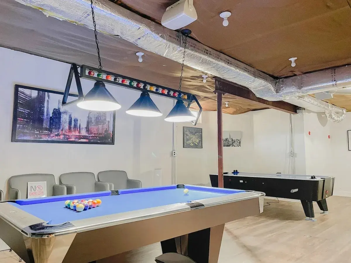 Pool table and air hockey in the game room